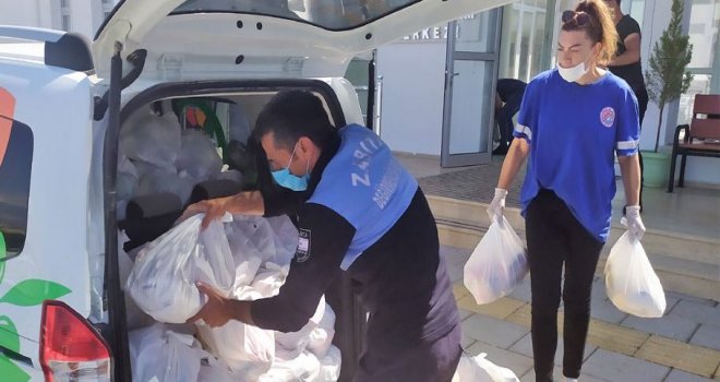 Değirmenlik bölgesinde yaşayan ihtiyaçlı kişilere süt ürünlerini içeren iaşe kolileri dağıtıldı
