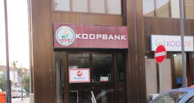 KOOP-BANK ZİRVEYE YÜRÜYOR